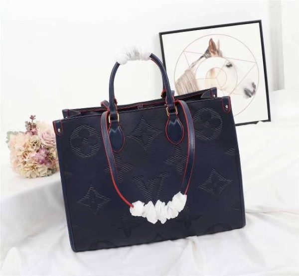 Replica Louis Vuitton Monogram Empreinte Giant Onthego GM Tote In Navy Blue - Image 2