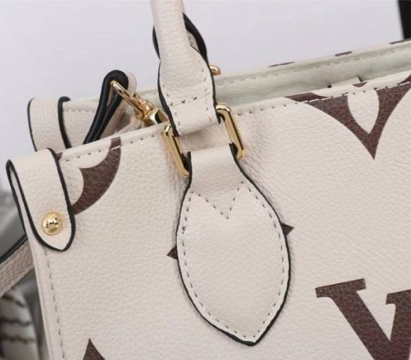 Replica Louis Vuitton Bicolor Monogram Empreinte Leather Onthego PM Bag In Cream And Bois De Rose Pink - Image 7