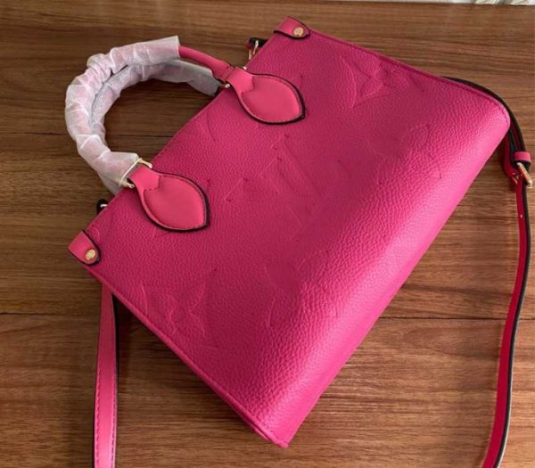 Replica Louis Vuitton Monogram Empreinte Leather Onthego PM Bag In Freesia Pink - Image 4