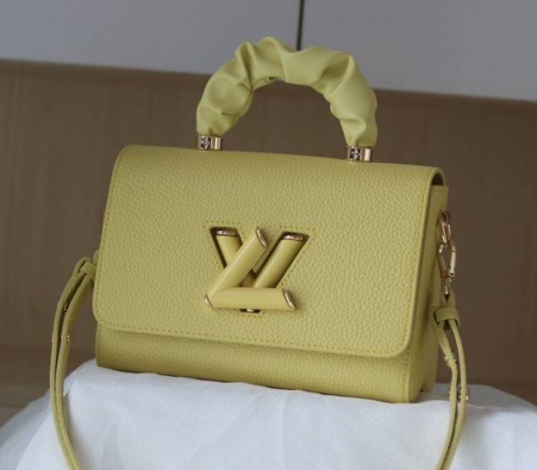 Replica Louis Vuitton Taurillon Leather Twist MM Scrunchie Handle In Ginger Yellow