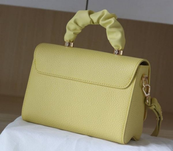 Replica Louis Vuitton Taurillon Leather Twist MM Scrunchie Handle In Ginger Yellow - Image 4