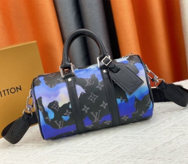 Replica Louis Vuitton Monogram Eclipse Keepall Bandouliere 25 Travel Bag In Blue And Purple Sunrise