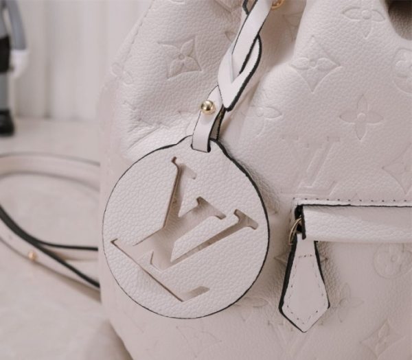 Replica Louis Vuitton Monogram Empreinte Leather Montsouris PM Backpack In White - Image 8