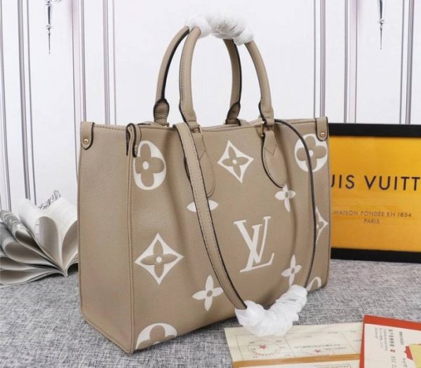 Replica Louis Vuitton Monogram Empreinte OnTheGo MM Tote In Tourterelle Gray - Image 2