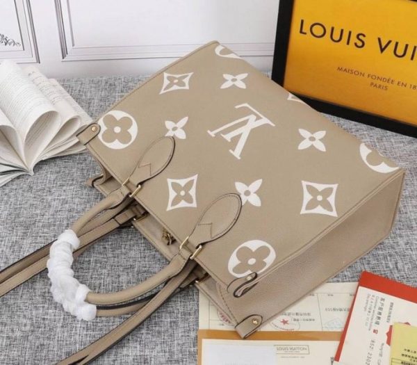 Replica Louis Vuitton Monogram Empreinte OnTheGo MM Tote In Tourterelle Gray - Image 4