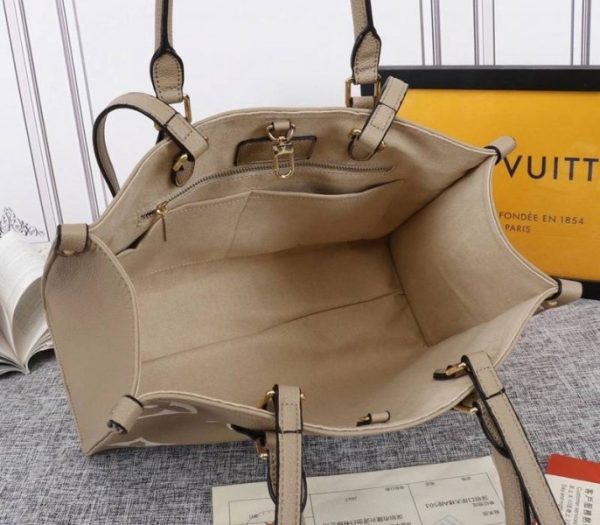 Replica Louis Vuitton Monogram Empreinte OnTheGo MM Tote In Tourterelle Gray - Image 5