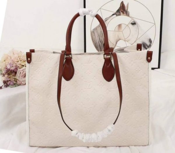 Replica Louis Vuitton Monogram Empreinte Onthego GM Tote In Cream