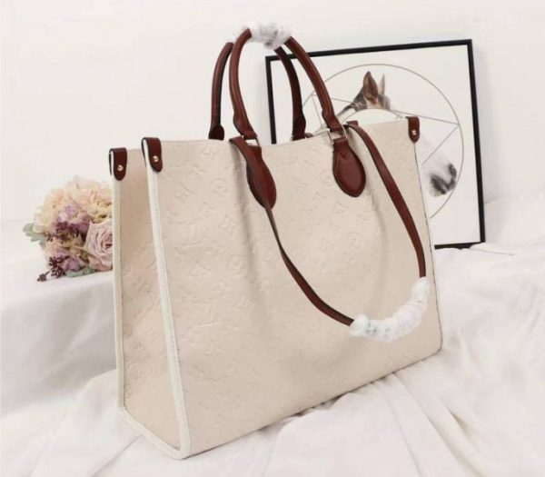 Replica Louis Vuitton Monogram Empreinte Onthego GM Tote In Cream - Image 2