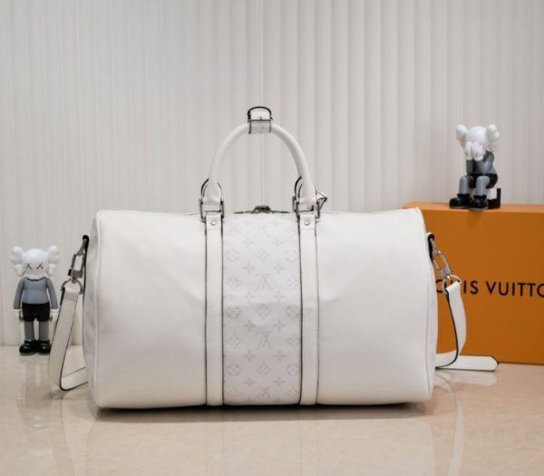 Replica Louis Vuitton Taiga Leather Keepall Bandouliere 50 Travel Bag In White - Image 3