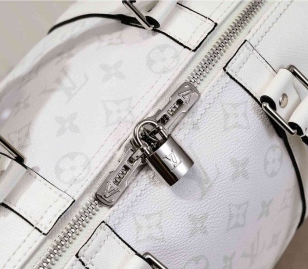 Replica Louis Vuitton Taiga Leather Keepall Bandouliere 50 Travel Bag In White - Image 7