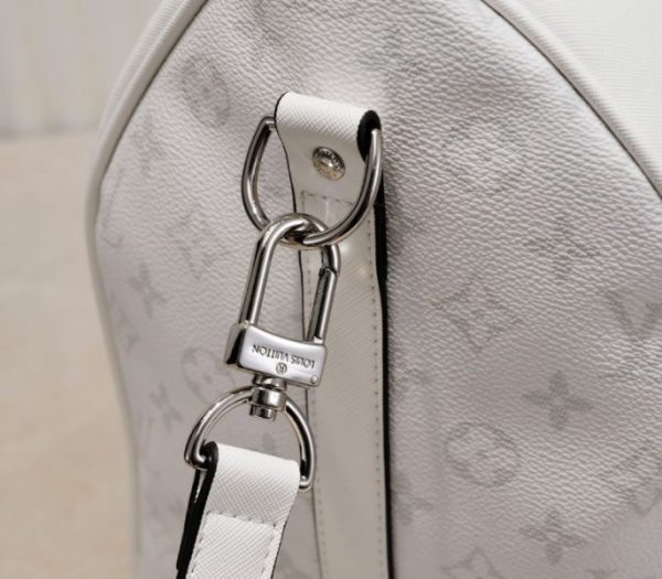 Replica Louis Vuitton Taiga Leather Keepall Bandouliere 50 Travel Bag In White - Image 8